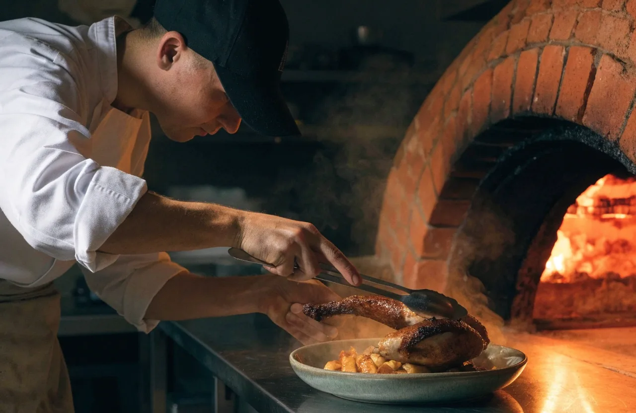 Baked pasta dish on a dark restaurant table
